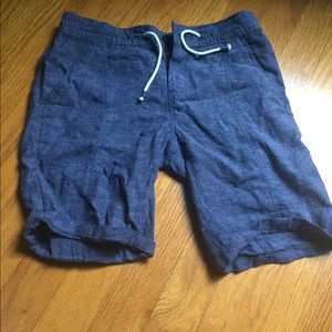 Blue drawstring shorts.